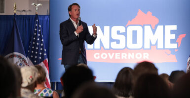 Republican Virginia Gov. Glenn Youngkin is seen here campaigning for his would-be successor, Lt. Gov. Winsome Earle-Sears, on July 1 in Vienna, Virginia.