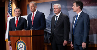 Senate Majority Leader John Thune, R-S.D., speaks at a press conference Wednesday, flanked by Republican Sens. John Barrasso of Wyoming (left); John Hoeven of North Dakota (center right); and Bernie Moreno of Ohio.