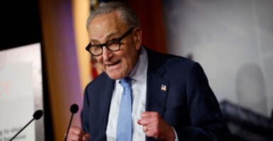 Chuck Schumer with fists clenched.