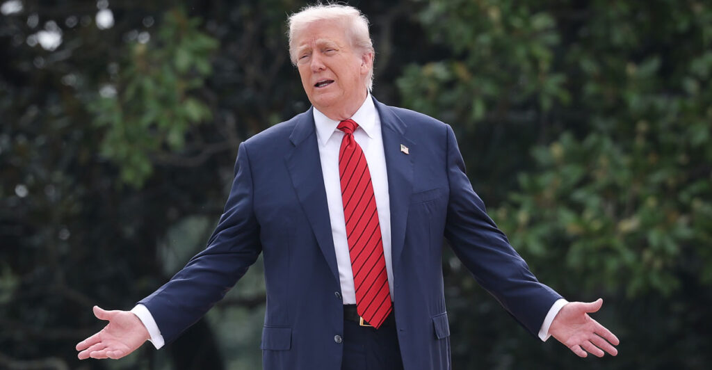 President Trump outside the White House, his arms outstretched