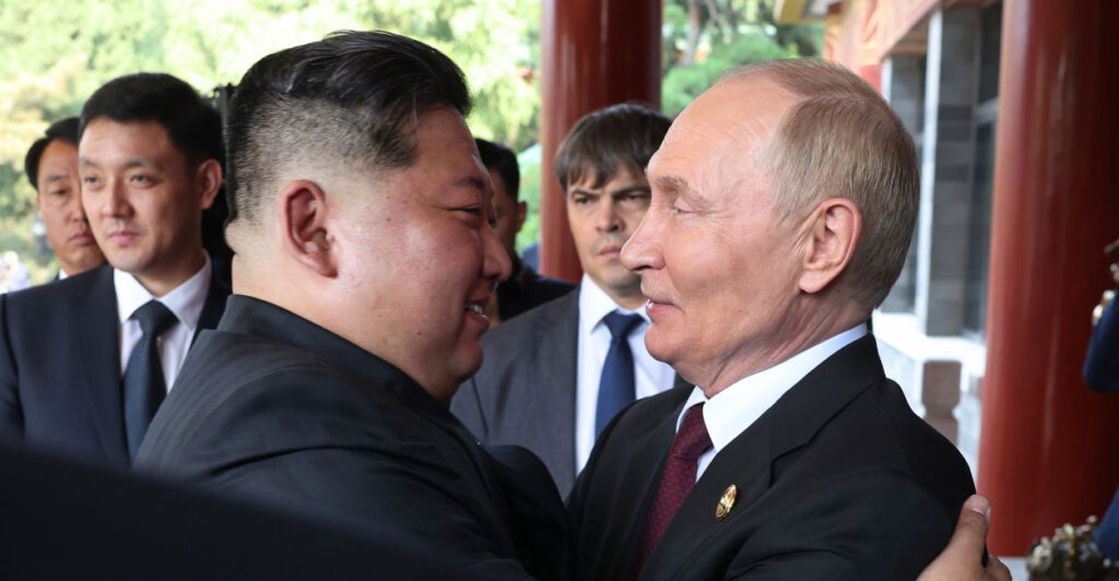 Russian President Vladimir Putin (right) greets North Korean dictator Kim Jong Un in Beijing, China, on Sept. 3.