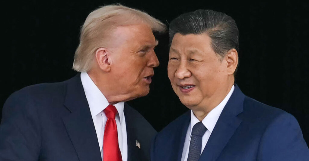 Donald Trump speaks into the ear of a smiling Xi Jinping.