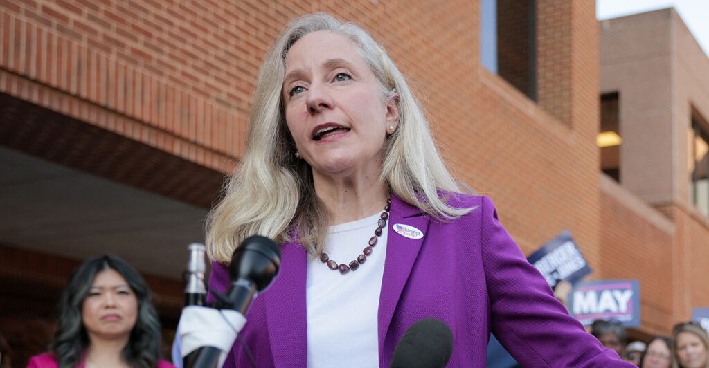 Abigail Spanberger in blue and white