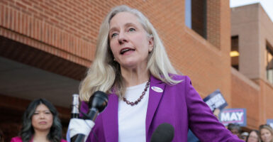 Abigail Spanberger in blue and white