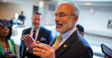 House Freedom Caucus Chairman Rep. Andy Harris of Maryland speaks to reporters in the Capitol.