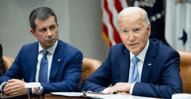 Pete Buttigieg sits next to Joe Biden in the White House in 2024