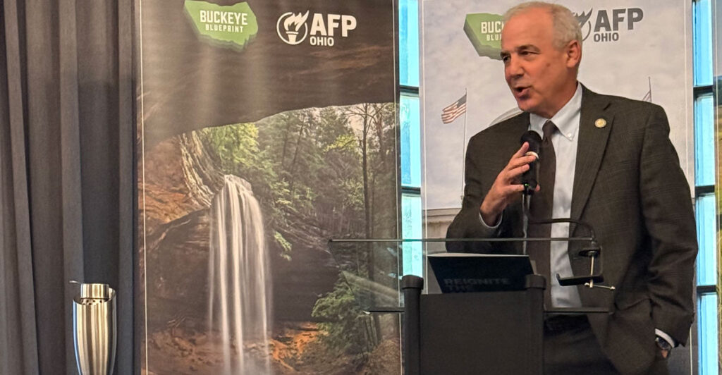 Speaker Matt Huffman speaks at the podium in front of AFP-Ohio sign.