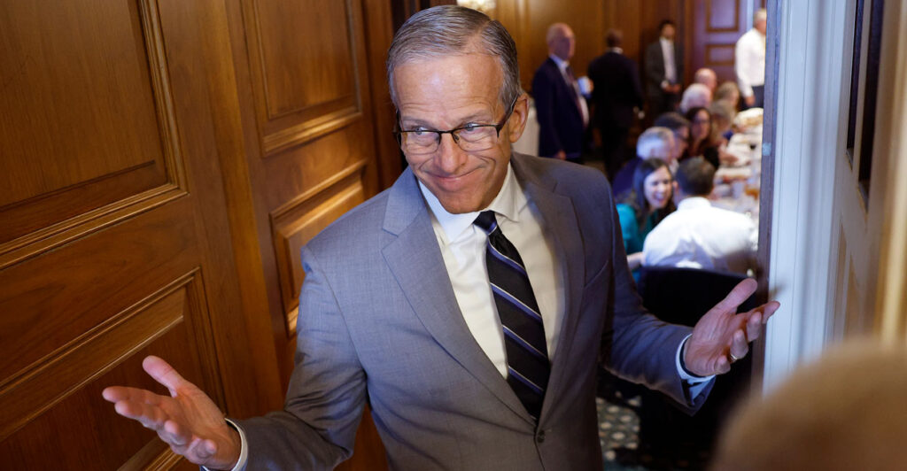 Senate Majority Leader John Thune speaks to reporters in the capitol.
