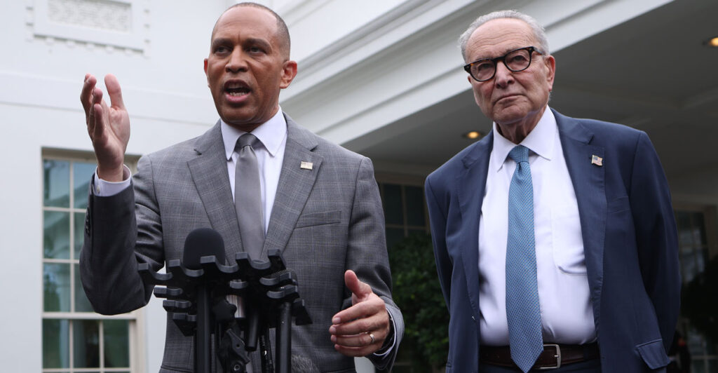 House Minority Leader Hakeem Jeffries (left) and Senate Minority Leader Chuck Schumer, both D-N.Y., speak to reporters in front of the White House.