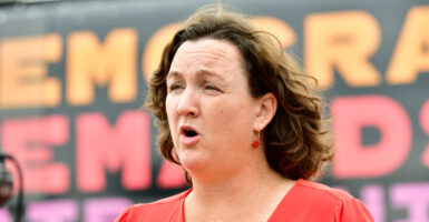 Katie Porter speaks at a rally.