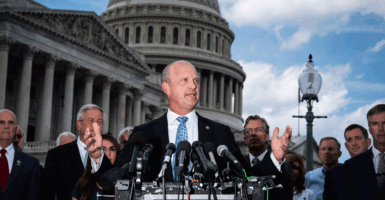 Kevin Roberts, president of The Heritage Foundation, speaks with members of the conservative House Freedom Caucus during a news conference on Capitol Hill on Tuesday, Sept 12, 2023