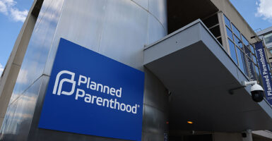 A blue Planned Parenthood sign