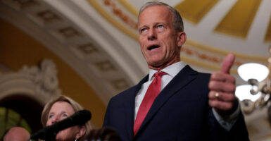 Senate Majority Leader John Thune speaks at a press conference.