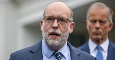 Office of Management and Budget Director Russ Vought with Senate Majority Leader John Thune, R-S.D., looking on.