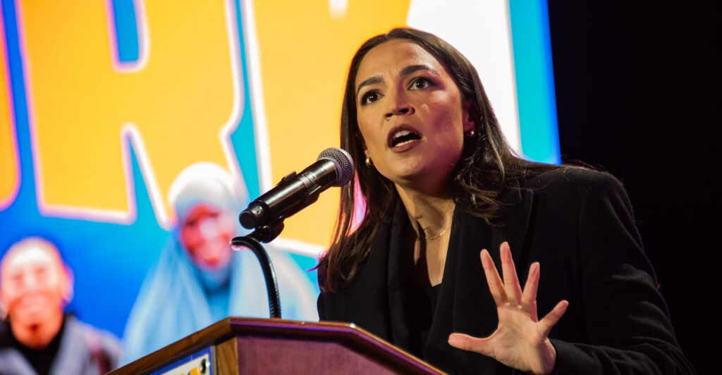 Rep. Alexandria Ocasio-Cortez, D-N.Y., addresses a crowd at Forest Hills Stadium in Queens, New York, for mayoral candidate Zohran Mamdani's campaign on Oct. 26.