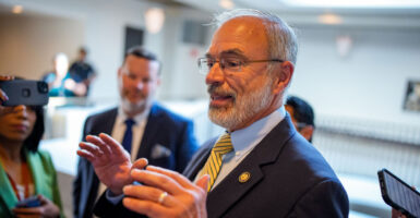 House Freedom Caucus Chairman Rep. Andy Harris, R-Md., speaks to reporters as he leaves a news conference on Capitol Hill.