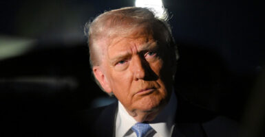 Donald Trump looks straight ahead.