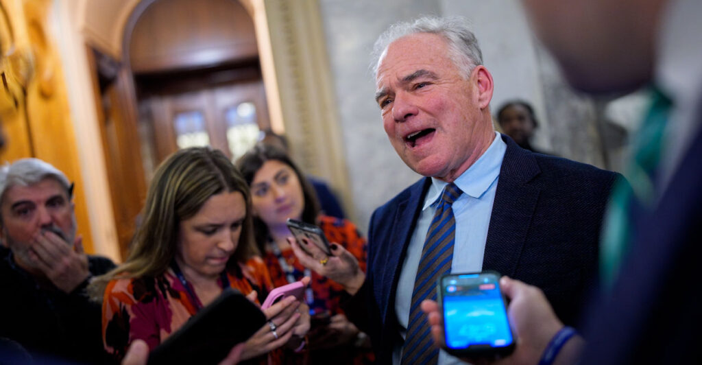 Sen. Tim Kaine talks to reporters on Capital Hill.