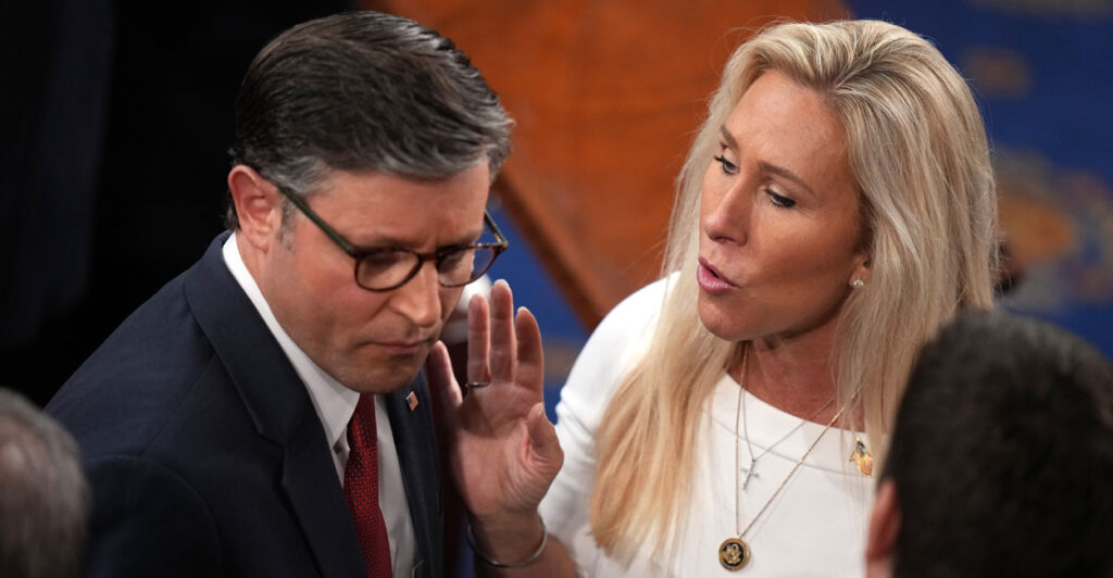 Speaker of the House Mike Johnson, R-La., talks to Rep. Marjorie Tayler Greene, R-Ga.