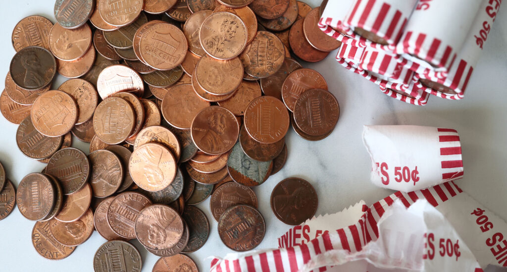 Pennies are seen on a table, as U.S. President Donald Trump directed the Treasury Department to stop minting new pennies.