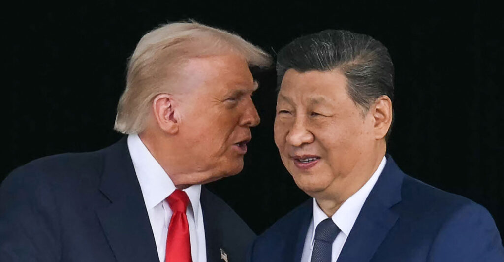 President Donald Trump talks to Chinese leader Xi Jinping