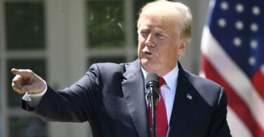 US President Donald Trump speaks and points during a joint press conference with Nigerian President Muhammadu Buhari in the Rose Garden of the White House on April 30, 2018, in Washington, DC.