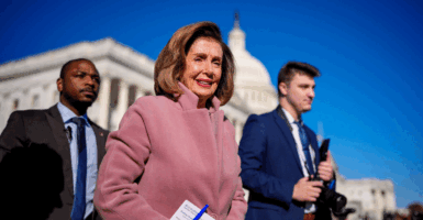 Rep. Nancy Pelosi on the steps of the U.S. Capitol Building on November 13