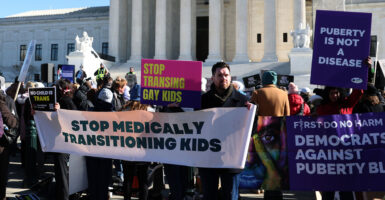Protesters at the Supreme Court oppose "gender-affirming care"