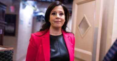 Elise Stefanik walks through the capitol.