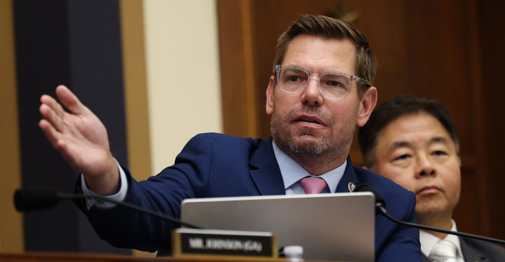 Rep. Eric Swalwell gestures during a committee hearing.