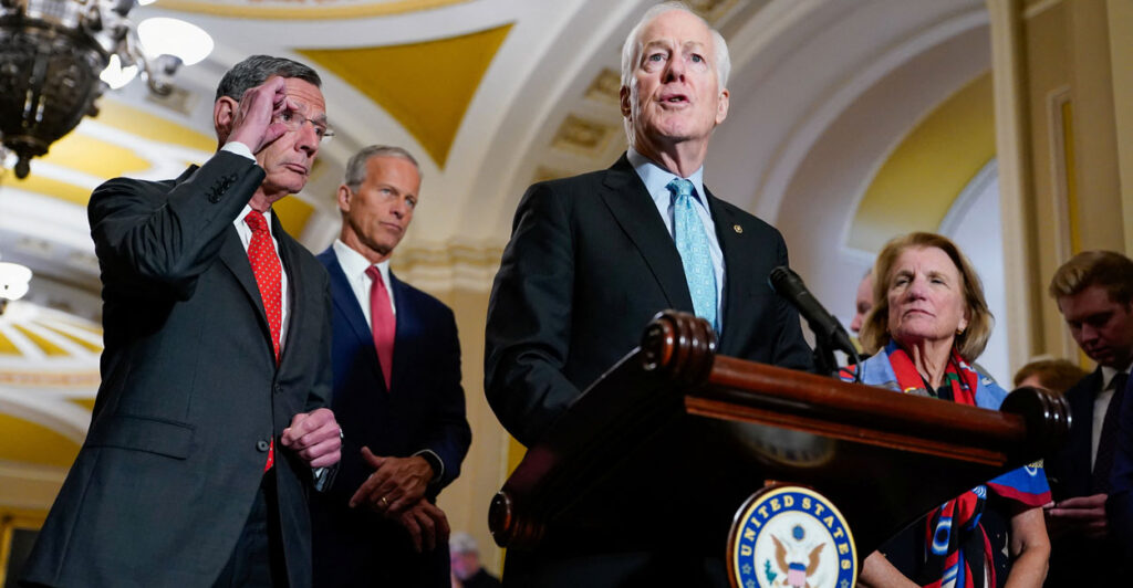 Sen. John Cornyn, R-Texas, speaks to reporters as Senate Republican leaders hold a press conference.