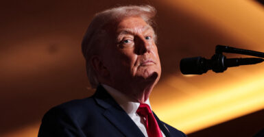 President Donald Trump looks on as he delivers remarks on the U.S. economy.