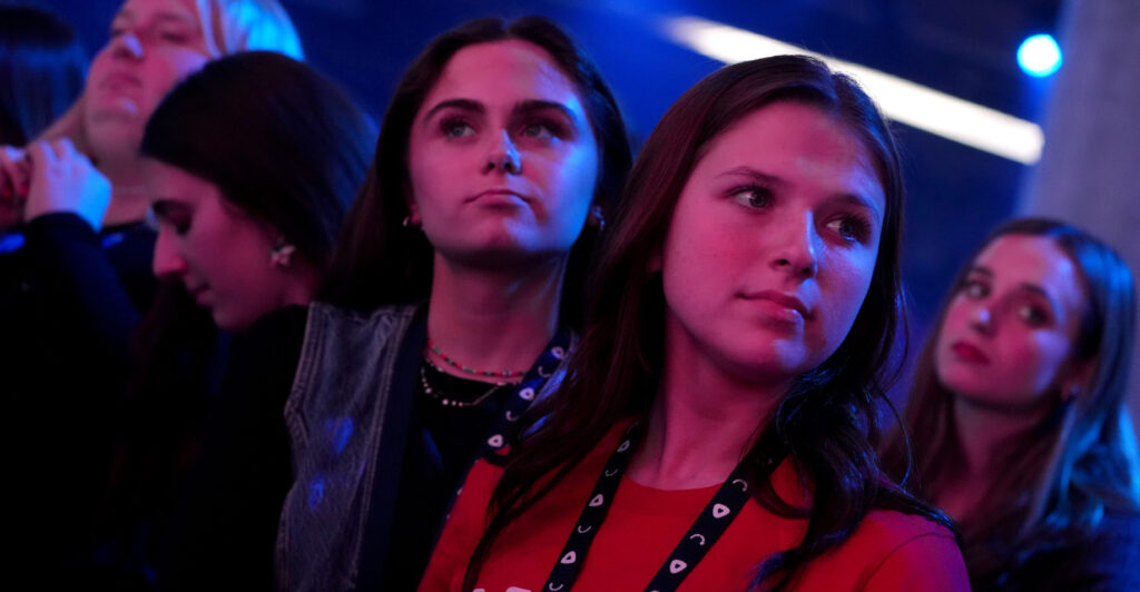 People watch from the crowd during America Fest