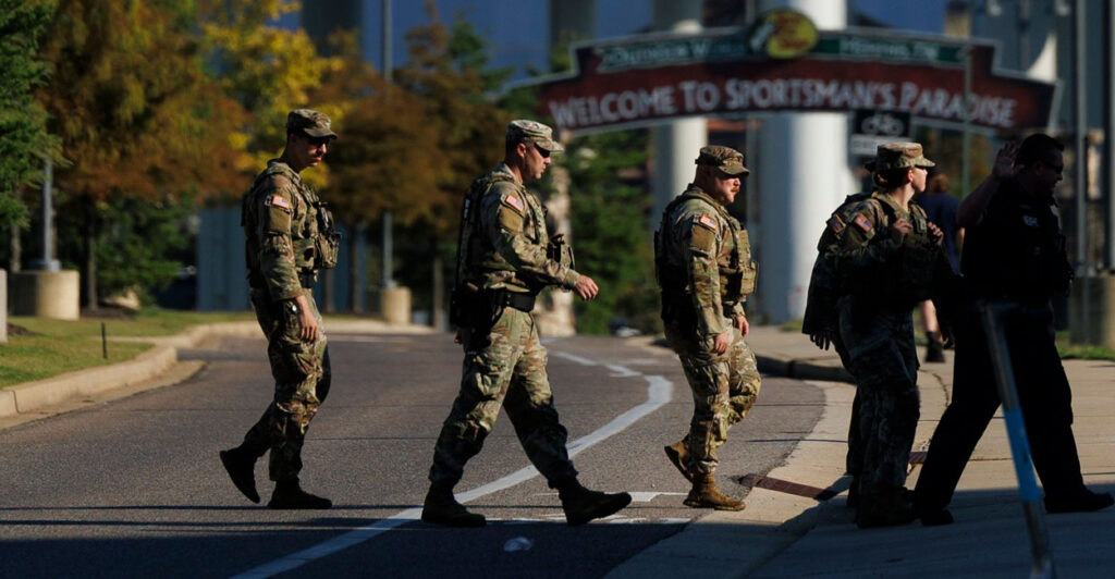 Members of the National Guard cross a street in Memphis.
