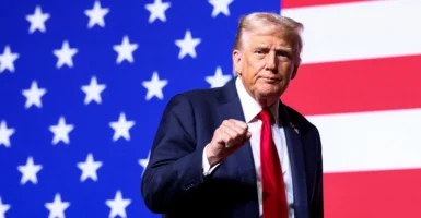 U.S. President Donald Trump gestures after speaking during a meeting of senior military leaders convened by U.S. Defense Secretary Pete Hegseth, at Marine Corps Base Quantico in Quantico, Virginia, U.S., September 30, 2025. REUTERS/Kevin Lamarque