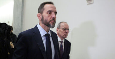 WASHINGTON, DC - DECEMBER 17: Former Special Counsel Jack Smith (C) arrives to testify during a closed-door deposition before the House Judiciary Committee in the Rayburn House Office Building on Capitol Hill on December 17, 2025 in Washington, DC. Smith was appointed independent special counsel by Attorney General Merrick Garland in 2022 to oversee two criminal investigations into former President Donald Trump's role in the January 6, 2021 attack on the U.S. Capitol and mishandling of classified documents. Both cases were eventually dismissed and Trump went on to win his second presidential election in 2024. (Photo by Chip Somodevilla/Getty Images)