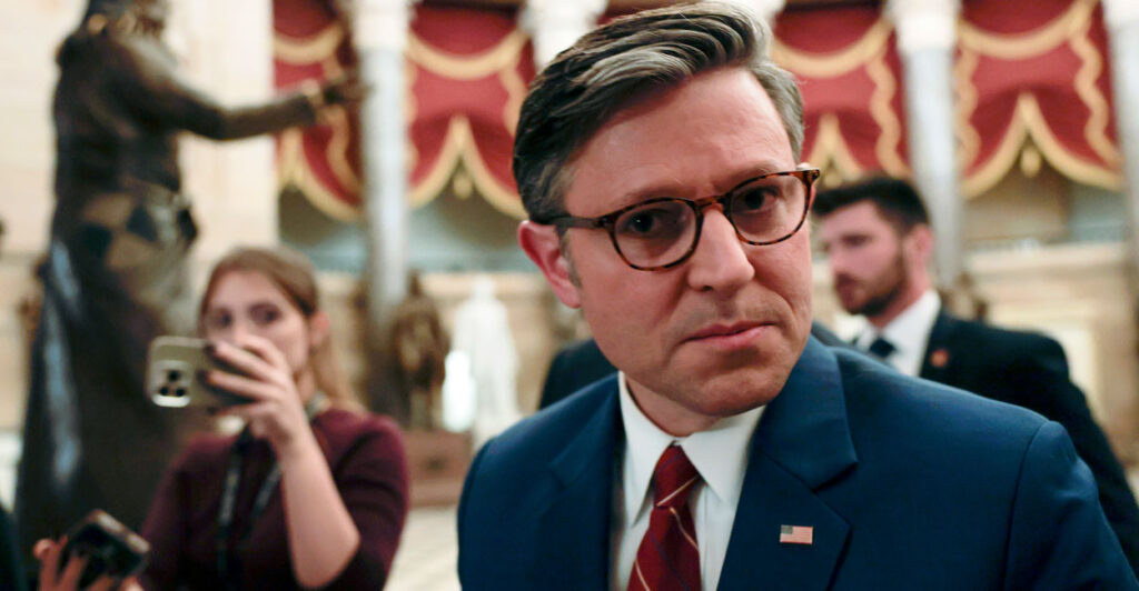 Mike Johnson speaks to reporters in the capitol.