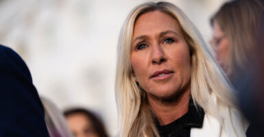 Marjorie Taylor Greene speaks at the capitol.