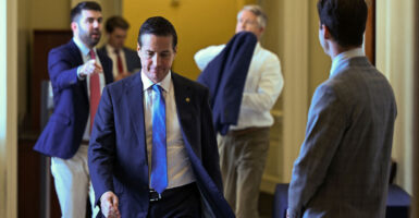 Sen. Bernie Moreno walks down a hallway on Capitol Hill.