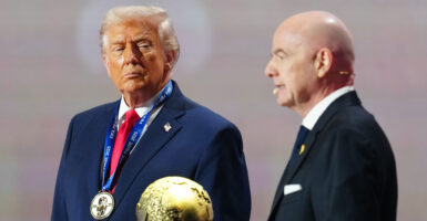 Donald Trump speaks with Gianni Infantino at the World Cup FIFA draw at the Kennedy Center.