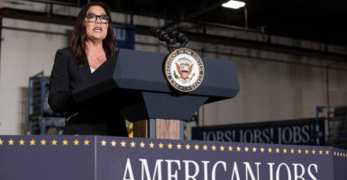 Labor Secretary Lori Chavez-DeRemer speaks at a podium.