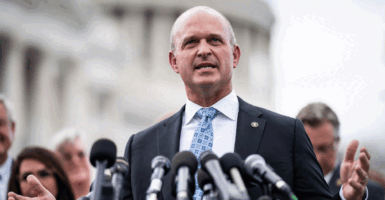 Kevin Roberts, president of The Heritage Foundation, speaks with members of the conservative House Freedom Caucus during a news conference on Capitol Hill on Tuesday, Sept 12, 2023, in Washington, DC.