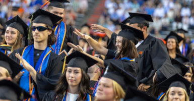 Students at Florida Gator graduation ceremony.