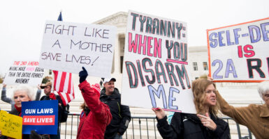 Gun-control advocates and Second Amendment advocates rally at the Supreme Court.