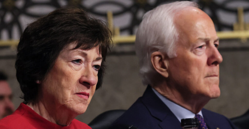 Republican Sens. Susan Collins of Maine and John Cornyn of Texas sit in committee.