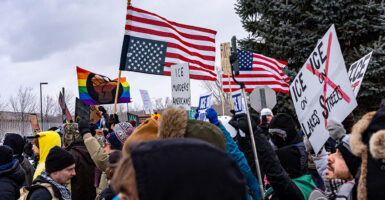 Anti-ICE protesters gather. The groups organizing opposition to ICE have not condemned the church invasion that took place on Sunday.