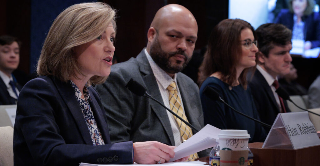 WASHINGTON, DC - JANUARY 07: (L-R) Republican Minnesota State Representatives Kristin Robbins, Walter Hudson and Marion Rarick and former U.S. Department of Justice Special Counsel Brendan Ballou testify before the House Oversight and Government Reform Committee about fraud in Minnesota at the U.S. Capitol on January 07, 2026 in Washington, DC. Federal prosecutors filed charges against dozens of people in Minnesota, many from the area's Somali community, with stealing upwards of billions of taxpayer dollars through fraudulent social services schemes. (Photo by Chip Somodevilla/Getty Images)