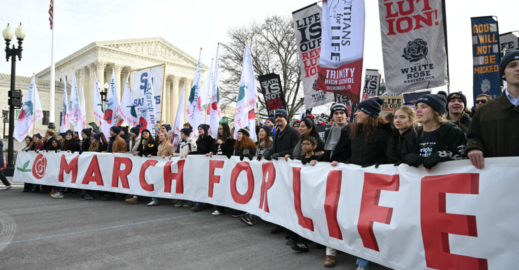 People march near the US Supreme Court during the 53rd annual March for Life rally in Washington, DC, on January 23, 2026.