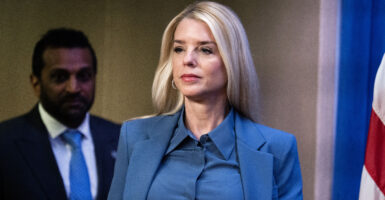 UNITED STATES - DECEMBER 4: Attorney General Pam Bondi and FBI Director Kash Patel arrive for a news conference at the Department of Justice on Thursday, December 4, 2025, announcing the arrest of Brian Cole Jr., who allegedly placed pipe bombs near the Republican and Democratic National Committee offices on January 6, 2021. (Tom Williams/CQ-Roll Call, Inc via Getty Images)