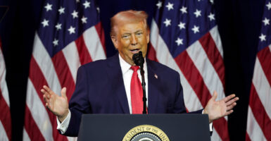 President Donald Trump addresses a House Republican retreat